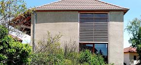 Reconversion d'une grange en pisé en habitation